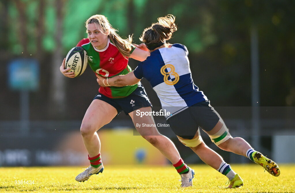 7 March 2026; Alana McInerney of Clovers is tackled by Erin King of Wolfhounds during the Celtic Challenge Round 10 match between Wolfhounds and Clovers at Belfield Bowl in Dublin. Photo by Shauna Clinton/Sportsfile