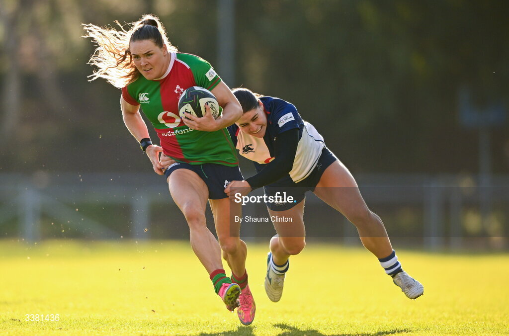 7 March 2026; Béibhinn Parsons of Clovers is tackled by Vicky Elmes Kinlan of Wolfhounds during the Celtic Challenge Round 10 match between Wolfhounds and Clovers at Belfield Bowl in Dublin. Photo by Shauna Clinton/Sportsfile