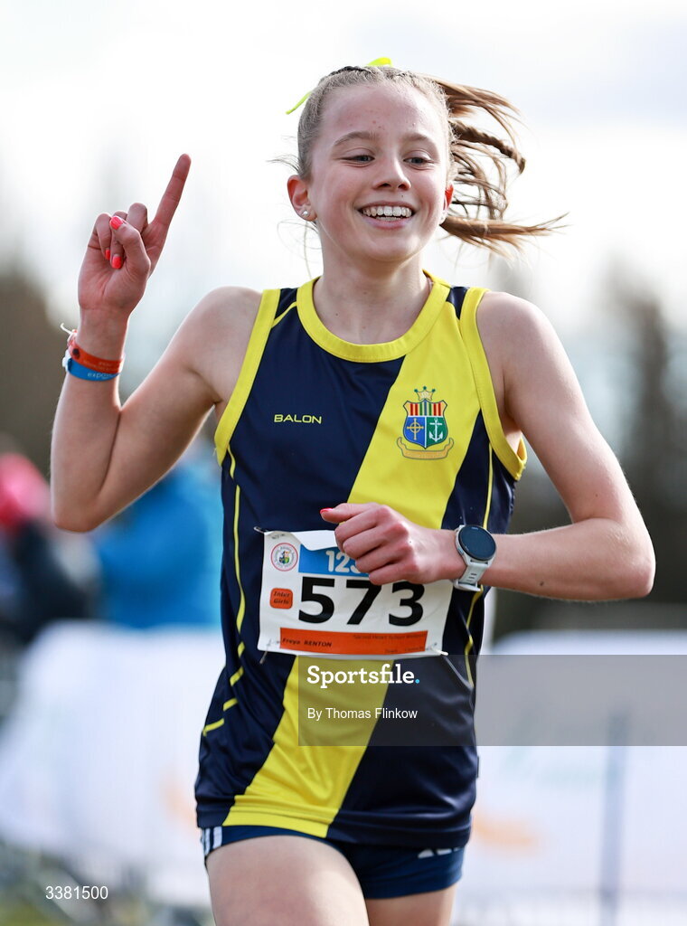 7 March 2026; Freya Renton of Sacred Heart School Westport, Mayo, celebrates at the finish line after winning the inter girls event during the 123.ie All Ireland Schools’ Cross Country Championships at Mallusk Playing Fields in Newtownabbey, Antrim. Photo by Thomas Flinkow/Sportsfile