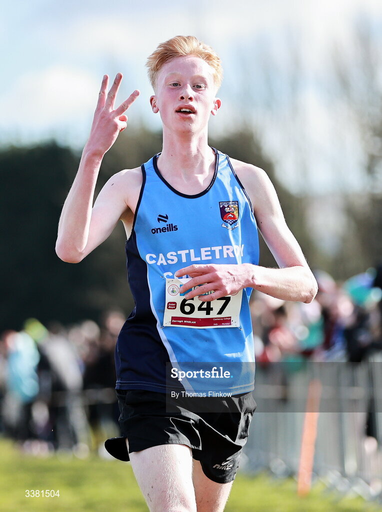 7 March 2026; Darragh Whelan of Castletroy College, Limerick, celebrates at the finish line after winning the inter boys event during the 123.ie All Ireland Schools’ Cross Country Championships at Mallusk Playing Fields in Newtownabbey, Antrim. Photo by Thomas Flinkow/Sportsfile