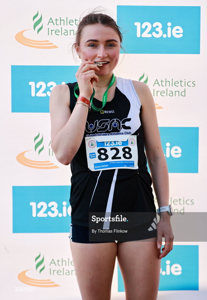 7 March 2026; Emma Hickey of St Marys Secondary School Newross, Wexford, celebrates with her gold medal after winning the senior girls event during the 123.ie All Ireland Schools’ Cross Country Championships at Mallusk Playing Fields in Newtownabbey, Antrim. Photo by Thomas Flinkow/Sportsfile