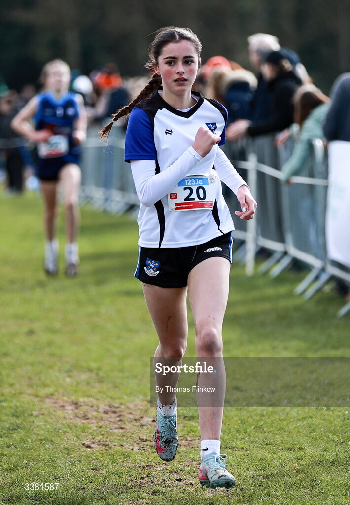 7 March 2026; Chloe Townsend of Our Lady and St Pats Knock, Antrim, competes in the minor girls event during the 123.ie All Ireland Schools’ Cross Country Championships at Mallusk Playing Fields in Newtownabbey, Antrim. Photo by Thomas Flinkow/Sportsfile