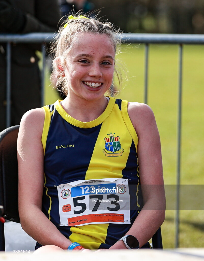 7 March 2026; Freya Renton of Sacred Heart School Westport, Mayo, celebrates after winning the inter girls event during the 123.ie All Ireland Schools’ Cross Country Championships at Mallusk Playing Fields in Newtownabbey, Antrim. Photo by Thomas Flinkow/Sportsfile