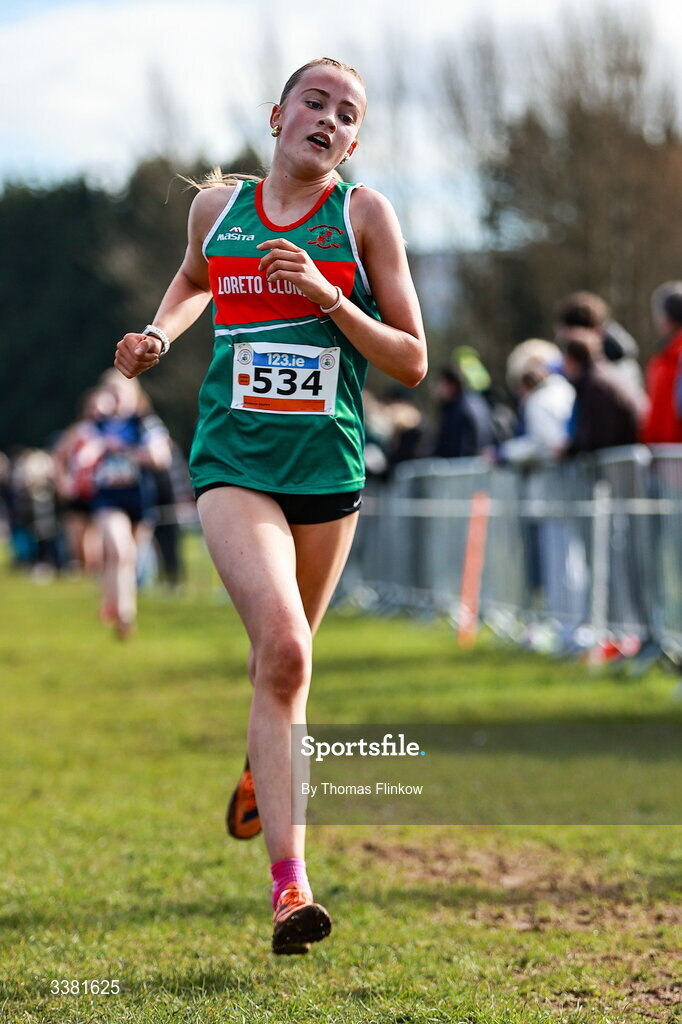 7 March 2026; Eadaoin Duffy of Loreto Clonmel, Tipperary, competes in the inter girls event during the 123.ie All Ireland Schools’ Cross Country Championships at Mallusk Playing Fields in Newtownabbey, Antrim. Photo by Thomas Flinkow/Sportsfile