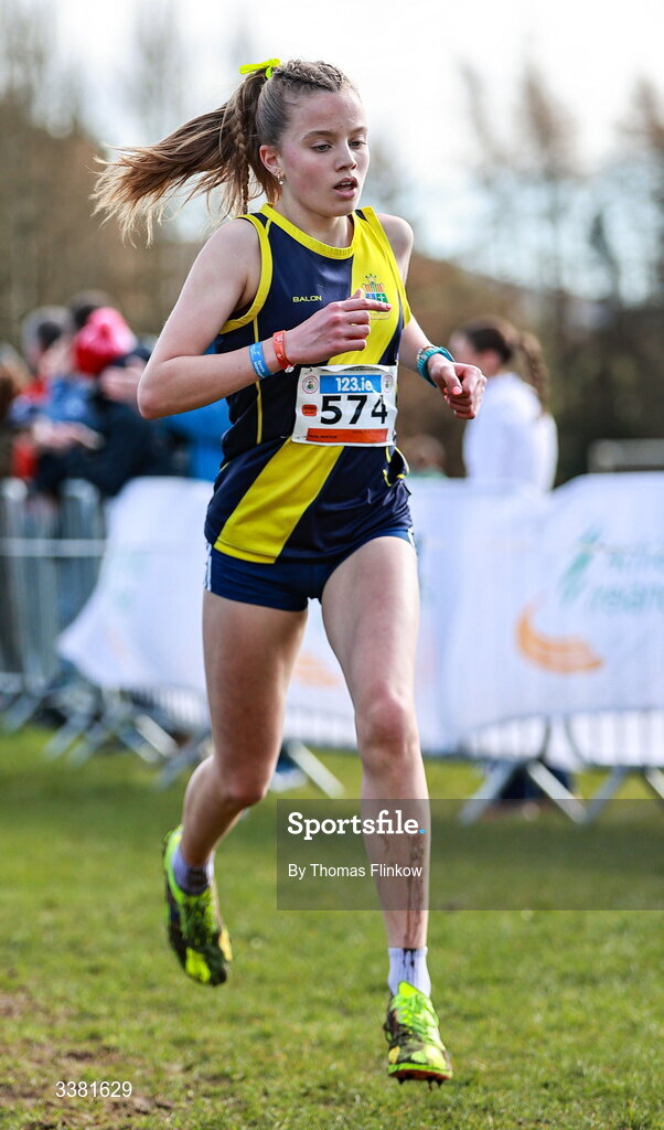 7 March 2026; Holly Renton of Sacred Heart School Westport, Mayo, competes in the inter girls event during the 123.ie All Ireland Schools’ Cross Country Championships at Mallusk Playing Fields in Newtownabbey, Antrim. Photo by Thomas Flinkow/Sportsfile