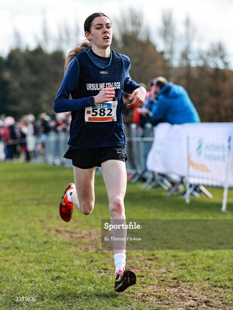 7 March 2026; Ava Colreavy of Ursuline College, Sligo, competes in the inter girls event during the 123.ie All Ireland Schools’ Cross Country Championships at Mallusk Playing Fields in Newtownabbey, Antrim. Photo by Thomas Flinkow/Sportsfile