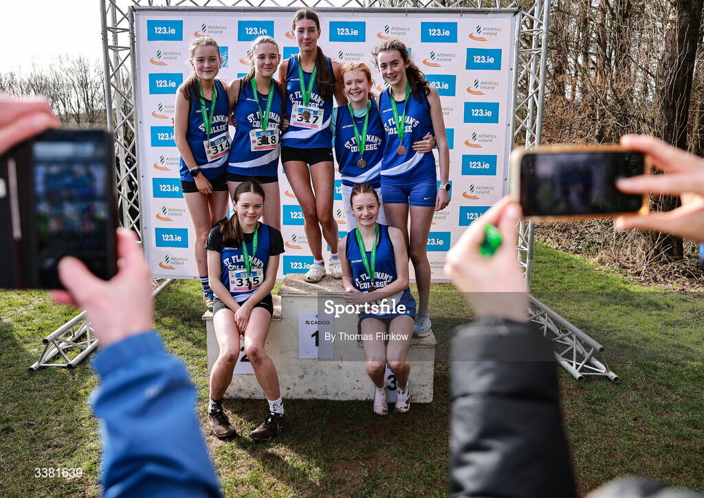 7 March 2026; Athletes of St Flannans Ennis, Clare, have their photo taken after the 123.ie All Ireland Schools’ Cross Country Championships at Mallusk Playing Fields in Newtownabbey, Antrim. Photo by Thomas Flinkow/Sportsfile