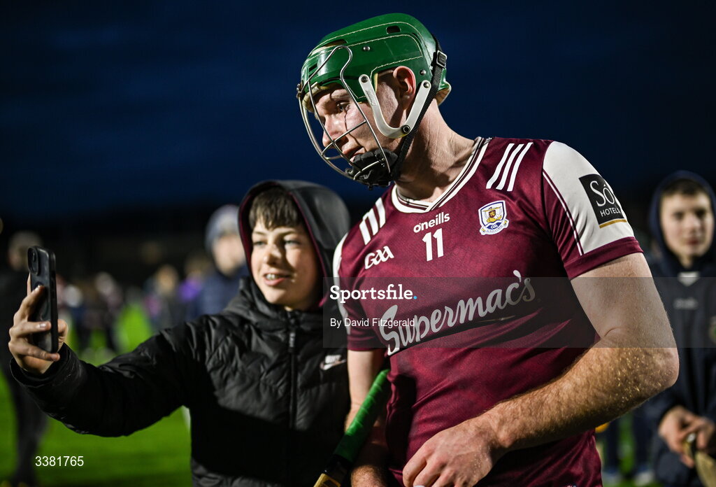 7 March 2026; Cathal Mannion of Galway poses for pictures with supporters after the Allianz Hurling League Division 1A match between Galway and Kilkenny at Pearse Stadium in Galway. Photo by David Fitzgerald/Sportsfile
