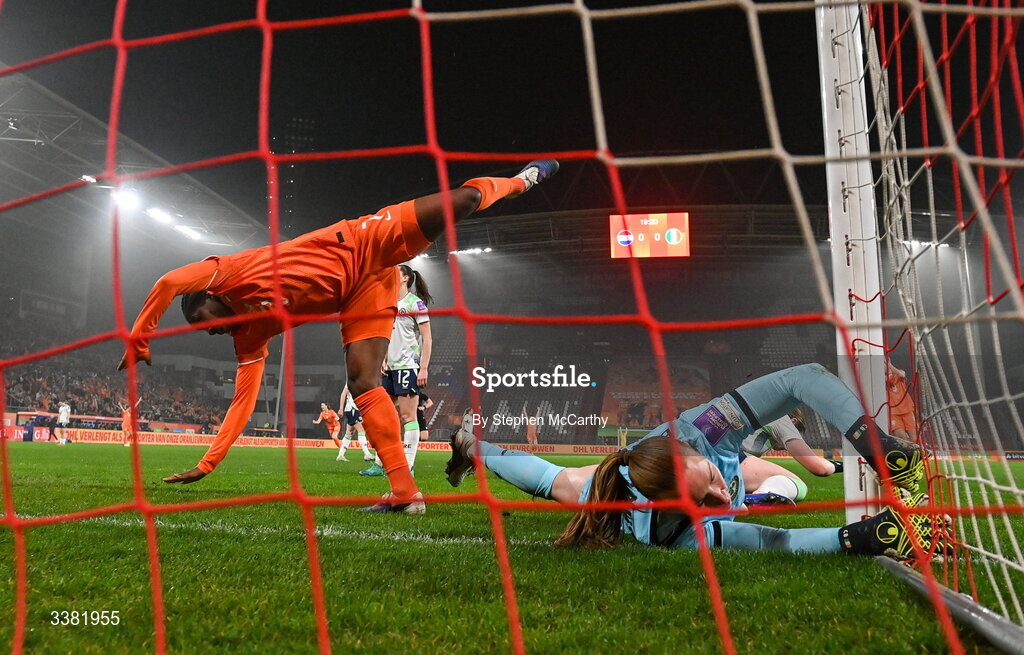 7 March 2026; Lineth Beerensteyn of Netherlands jumps over Republic of Ireland goalkeeper Courtney Brosnan after scoring her side's first goal during the 2027 FIFA Women’s World Cup Qualifier match between the Netherlands and Republic of Ireland at Stadion Galgenwaard in Utrecht, Netherlands. Photo by Stephen McCarthy/Sportsfile