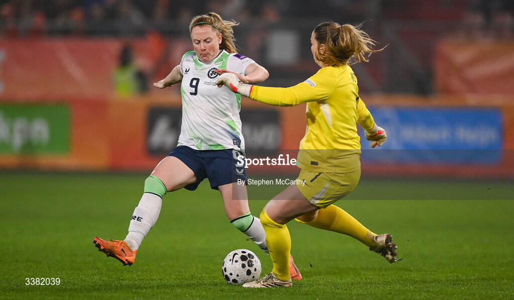 7 March 2026; Amber Barrett of Republic of Ireland in action against Netherlands goalkeeper Lize Kop during the 2027 FIFA Women’s World Cup Qualifier match between the Netherlands and Republic of Ireland at Stadion Galgenwaard in Utrecht, Netherlands. Photo by Stephen McCarthy/Sportsfile
