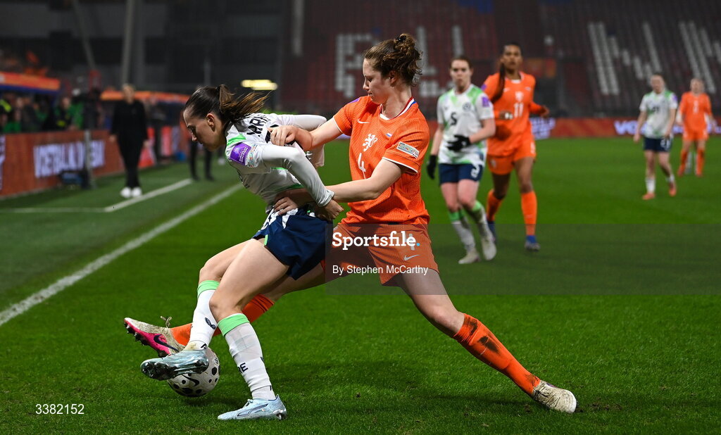 7 March 2026; Abbie Larkin of Republic of Ireland in action against Veerle Buurman of Netherlands during the 2027 FIFA Women’s World Cup Qualifier match between the Netherlands and Republic of Ireland at Stadion Galgenwaard in Utrecht, Netherlands. Photo by Stephen McCarthy/Sportsfile