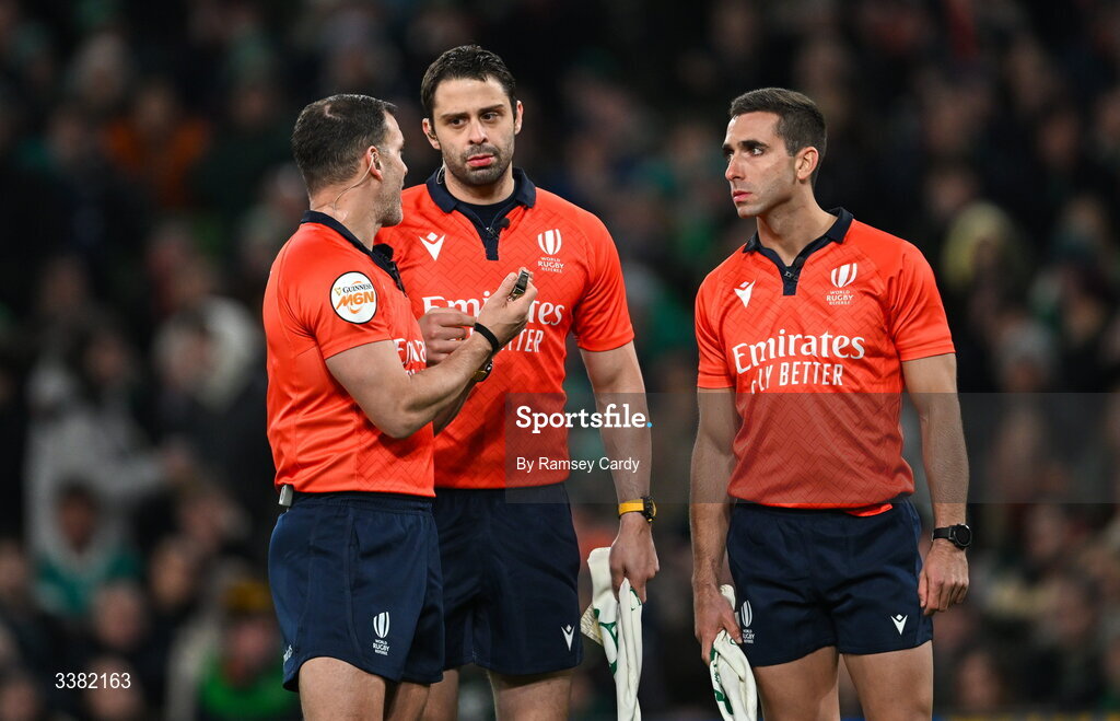 6 March 2026; Referee Karl Dickson, left, with Assistant referee Nika Amashukeli, centre, and Damian Schneider during the Guinness 6 Nations Rugby Championship match between Ireland and Wales at the Aviva Stadium in Dublin. Photo by Ramsey Cardy/Sportsfile