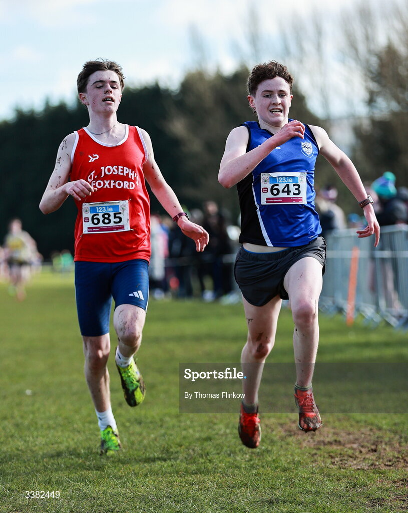 7 March 2026; Rory Gruddy of St Josephs Foxford Secondary School, Mayo, left, and Conan O'Doherty of St Patricks Maghera, Derry, competes in the inter boys event during the 123.ie All Ireland Schools’ Cross Country Championships at Mallusk Playing Fields in Newtownabbey, Antrim. Photo by Thomas Flinkow/Sportsfile