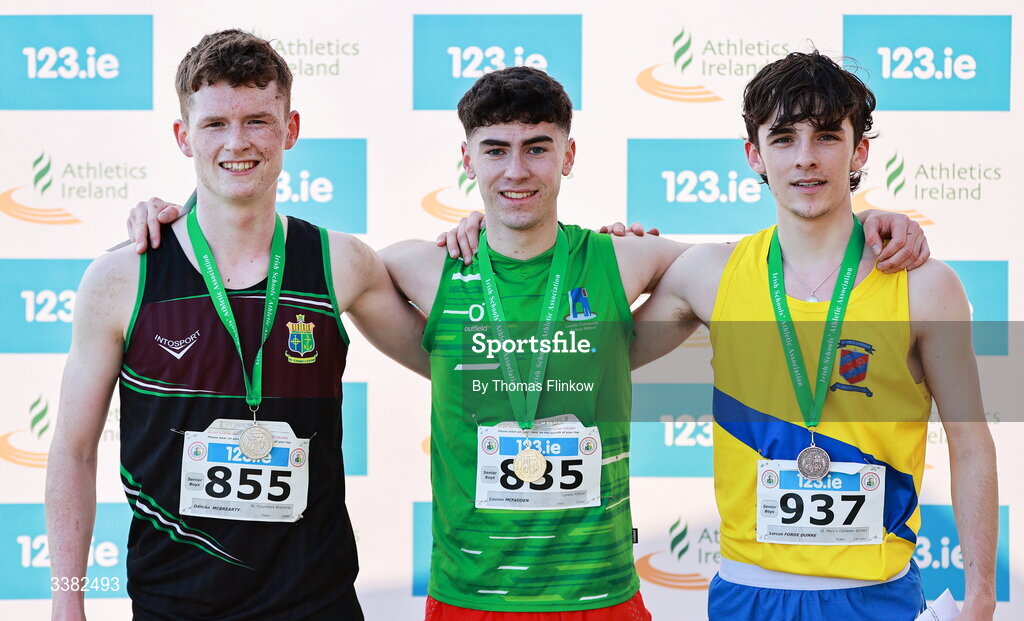 7 March 2026; Senior boys medallists, Caolan McFadden of Loreto Milford, Donegal, gold, centre, Odhrán McBrearty of St. Columba's Stranorlar, Donegal, silver, left, and Lorcan Forde Dunne of St. Mary's Diocesan School, Louth, bronze, right, during the 123.ie All Ireland Schools’ Cross Country Championships at Mallusk Playing Fields in Newtownabbey, Antrim. Photo by Thomas Flinkow/Sportsfile