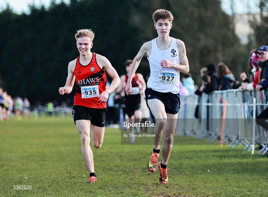7 March 2026; David Wajrak of St Mary's CBS Portlaoise Co. Laois, left, and James Foot of Blackrock College, Dublin, compete in the senior boys event during the 123.ie All Ireland Schools’ Cross Country Championships at Mallusk Playing Fields in Newtownabbey, Antrim. Photo by Thomas Flinkow/Sportsfile