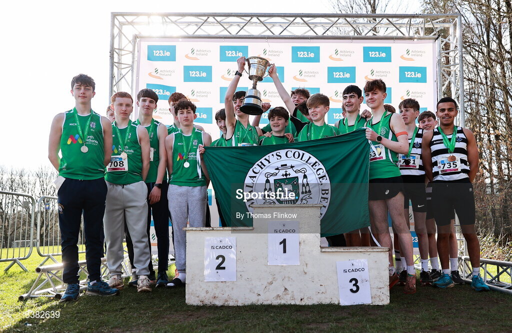 7 March 2026; Inter boys team medallists, St Malachys Belfast, gold, Colaiste Mhuire, silver, and St. Kieran's Kilkenny, bronze, celebrate after the 123.ie All Ireland Schools’ Cross Country Championships at Mallusk Playing Fields in Newtownabbey, Antrim. Photo by Thomas Flinkow/Sportsfile