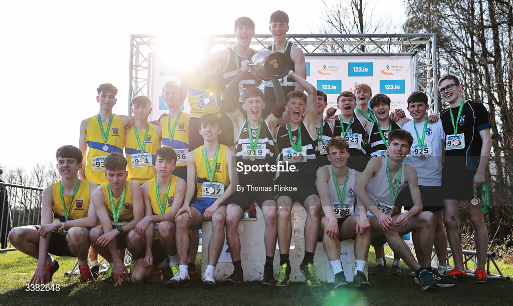7 March 2026; Senior boys team medallists, Belvedere College, gold, St. Mary's Diocesan School, silver, and Blackrock College, bronze, celebrate after the 123.ie All Ireland Schools’ Cross Country Championships at Mallusk Playing Fields in Newtownabbey, Antrim. Photo by Thomas Flinkow/Sportsfile