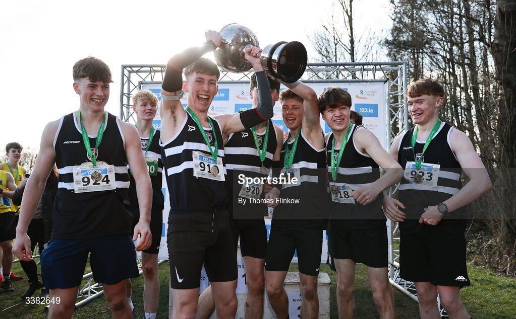 7 March 2026; Senior boys team gold medallists, Belvedere College, celebrate after the 123.ie All Ireland Schools’ Cross Country Championships at Mallusk Playing Fields in Newtownabbey, Antrim. Photo by Thomas Flinkow/Sportsfile