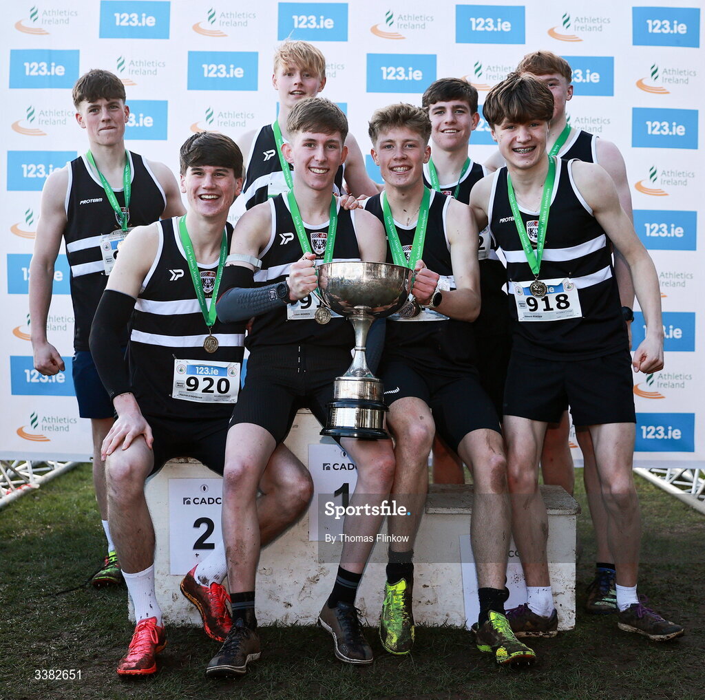 7 March 2026; Senior boys team gold medallists, Belvedere College, celebrate after the 123.ie All Ireland Schools’ Cross Country Championships at Mallusk Playing Fields in Newtownabbey, Antrim. Photo by Thomas Flinkow/Sportsfile