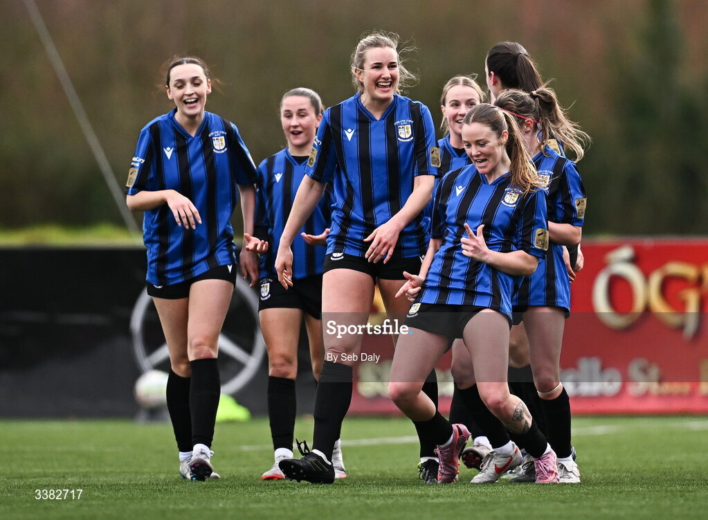 8 March 2026; Dana Scheriff of Athlone Town, front, celebrates after scoring her side's first goal during the 2026 Women's President's Cup final match between Athlone Town and Shelbourne at Athlone Town Stadium in Westmeath. Photo by Seb Daly/Sportsfile
