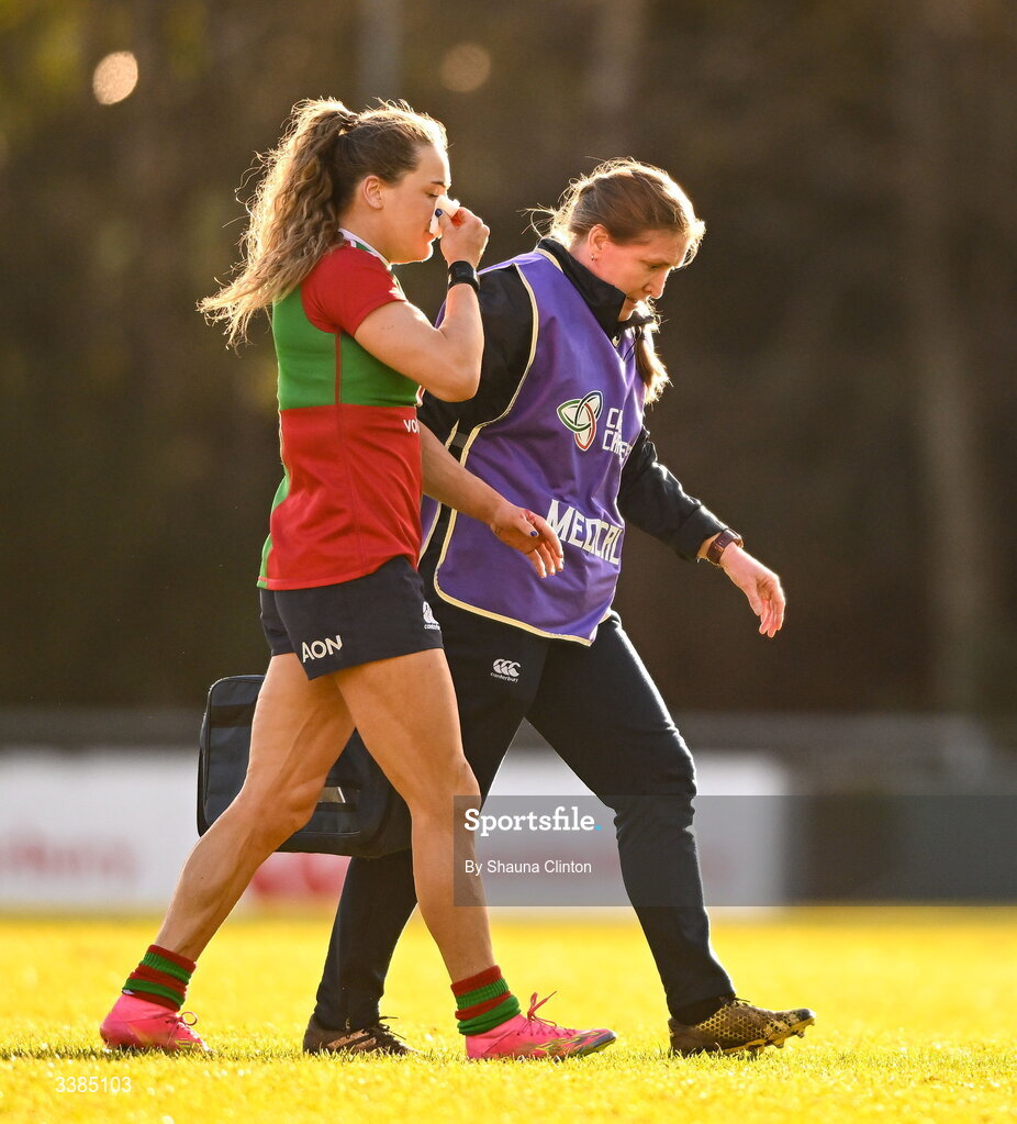 7 March 2026; Béibhinn Parsons of Clovers leaves the pitch to receive medical attention during the Celtic Challenge Round 10 match between Wolfhounds and Clovers at Belfield Bowl in Dublin. Photo by Shauna Clinton/Sportsfile