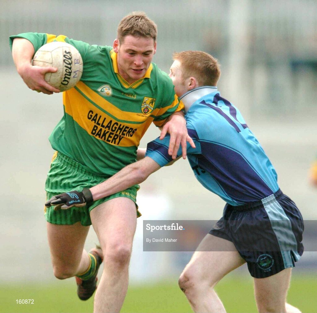 14 November 2004; Brendan O'Boyle, Ardara, is tackled by Adrian Barry, Mayobridge. AIB Ulster Senior Club Football Championship Quarter Final Replay, Mayobridge v Ardara, Newry, Co. Down. Picture credit; David Maher / SPORTSFILE