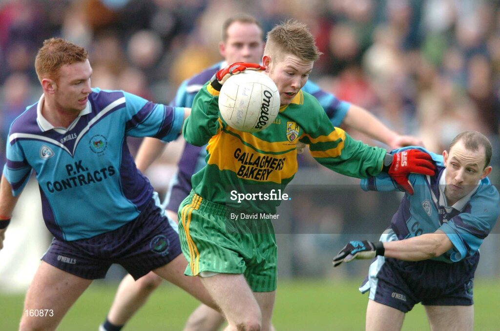 14 November 2004; Gareth Concar, Ardara, in action against Ronan O Hara, left and Gavin Barry, Mayobridge. AIB Ulster Senior Club Football Championship Quarter Final Replay, Mayobridge v Ardara, Newry, Co. Down. Picture credit; David Maher / SPORTSFILE