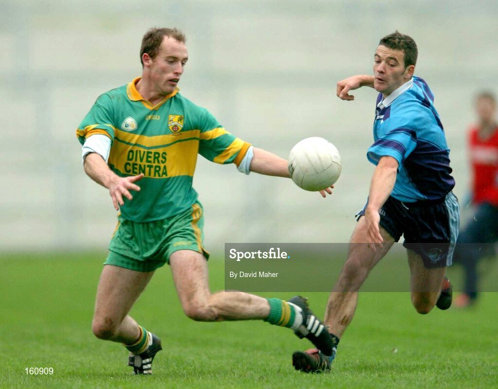 14 November 2004; Kevin Byrne, Ardara, in action against Noel Sexton, Mayobridge. AIB Ulster Senior Club Football Championship Quarter Final Replay, Mayobridge v Ardara, Newry, Co. Down. Picture credit; David Maher / SPORTSFILE