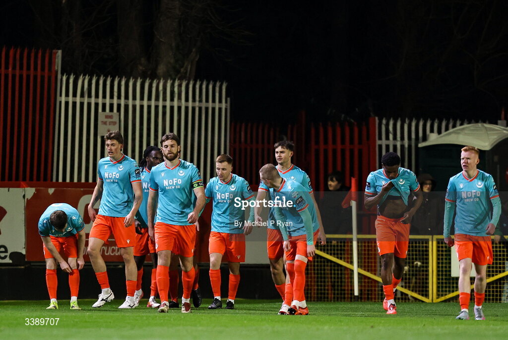 13 March 2026; Drogheda United players celebrate their sides first goal scored by Thomas Oluwa, hidden, during the SSE Airtricity Men's Premier Division match between St Patrick's Athletic and Drogheda United at Richmond Park in Dublin. Photo by Michael P Ryan/Sportsfile