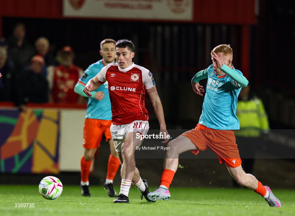 13 March 2026; Kian Leavy of St Patrick's Athletic in action against Shane Farrell of Drogheda United during the SSE Airtricity Men's Premier Division match between St Patrick's Athletic and Drogheda United at Richmond Park in Dublin. Photo by Michael P Ryan/Sportsfile