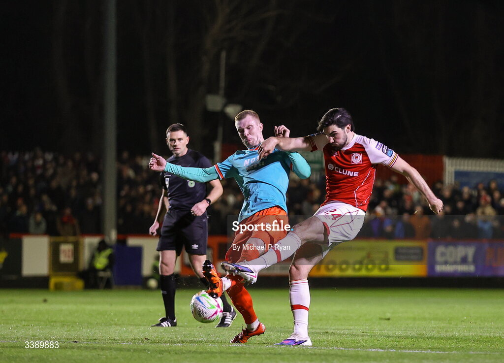 13 March 2026; Luke Turner of St Patrick's Athletic has a shot on goal despite the attention of Mark Doyle during the SSE Airtricity Men's Premier Division match between St Patrick's Athletic and Drogheda United at Richmond Park in Dublin. Photo by Michael P Ryan/Sportsfile