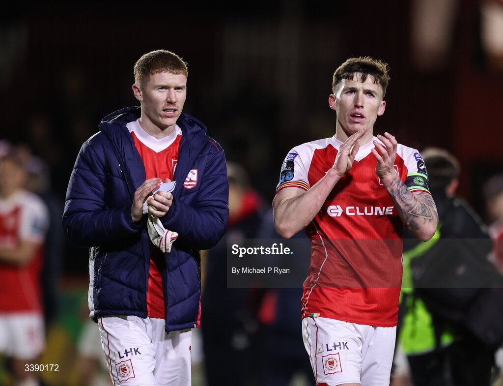 13 March 2026; St Patrick's Athletic players, from left, Darragh Nugent and Joe Redmond acknowledges their supporters after the SSE Airtricity Men's Premier Division match between St Patrick's Athletic and Drogheda United at Richmond Park in Dublin. Photo by Michael P Ryan/Sportsfile
