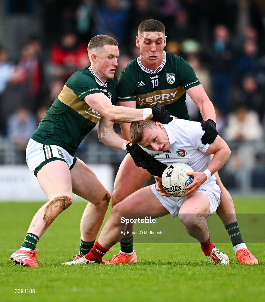 14 March 2026; Ryan O'Donoghue of Mayo in action against Jason Foley, left, and Joe O'Connor of Kerry during the Allianz Football League Division 1 match between Kerry and Mayo at Austin Stack Park in Tralee, Kerry. Photo by Piaras Ó Mídheach/Sportsfile