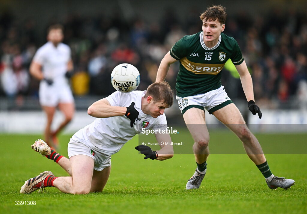 14 March 2026; Rory Brickenden of Mayo loses possession under pressure from Keith Evans of Kerry during the Allianz Football League Division 1 match between Kerry and Mayo at Austin Stack Park in Tralee, Kerry. Photo by Piaras Ó Mídheach/Sportsfile