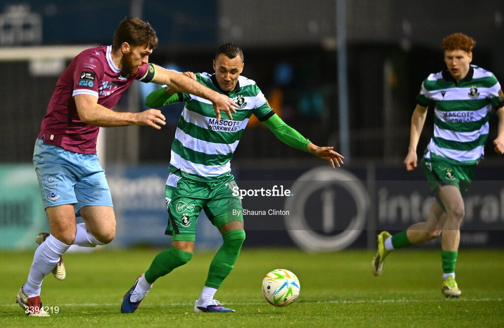 16 March 2026; Conor Keeley of Drogheda United in action against Graham Burke of Shamrock Rovers during the SSE Airtricity Men's Premier Division match between Drogheda United and Shamrock Rovers at Sullivan & Lambe Park in Drogheda, Louth. Photo by Shauna Clinton/Sportsfile