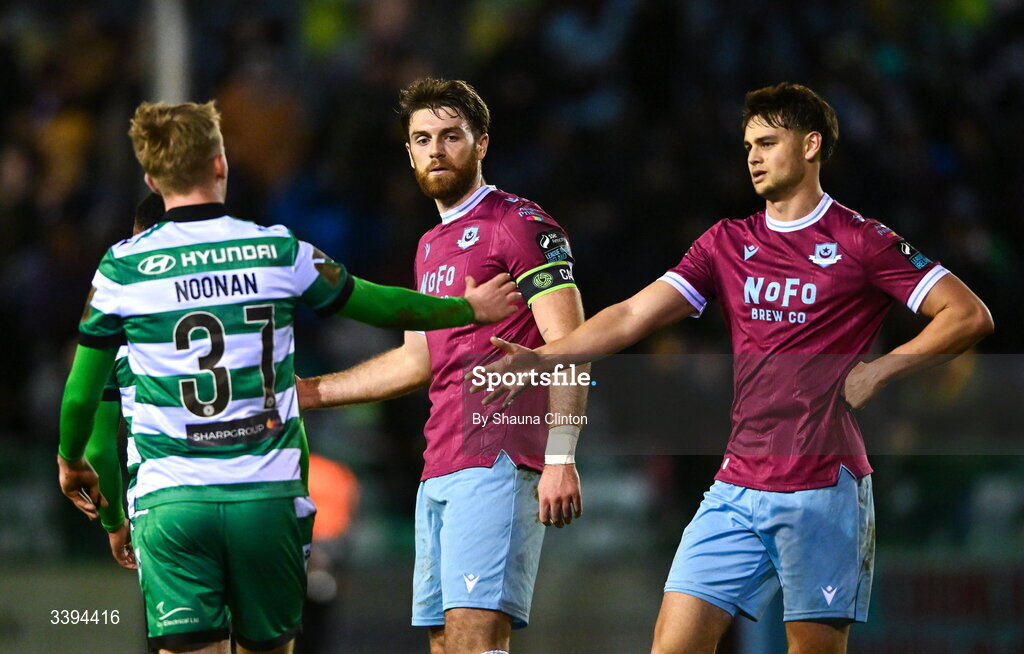 16 March 2026; Drogheda United players Conor Keeley, left, and Leo Burney with Michael Noonan of Shamrock Rovers after the SSE Airtricity Men's Premier Division match between Drogheda United and Shamrock Rovers at Sullivan & Lambe Park in Drogheda, Louth. Photo by Shauna Clinton/Sportsfile
