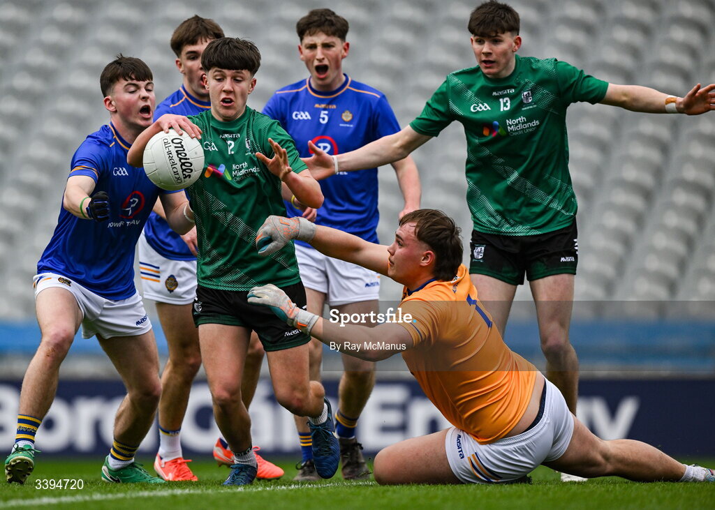 17 March 2026; Conor Cleary of Coláiste Mhuire, Mullingar is tackled by Mikey Corridon and Tralee CBS goalkeeper Olivier Lata during the Masita GAA Post Primary Schools Hogan Cup final match between Coláiste Mhuire Mullingar, Westmeath, and Tralee CBS, Kerry,  at Croke Park in Dublin. Photo by Ray McManus/Sportsfile