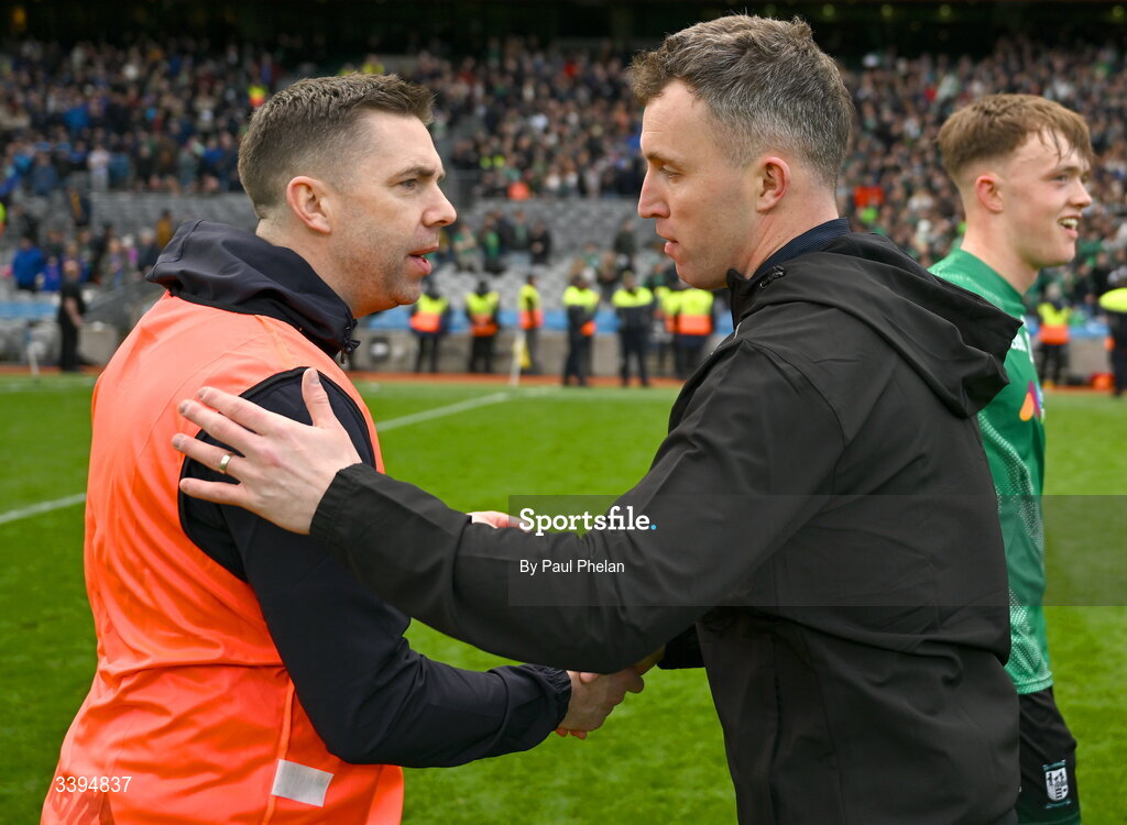 17 March 2026; Tralee CBS joint manager Marc Ó Sé, left, and Coláiste Mhuire Mullingar manager Dean McNicholas shake hands after the Masita GAA Post Primary Schools Hogan Cup final match between Coláiste Mhuire Mullingar, Westmeath, and Tralee CBS, Kerry, at Croke Park in Dublin. Photo by Paul Phelan/Sportsfile