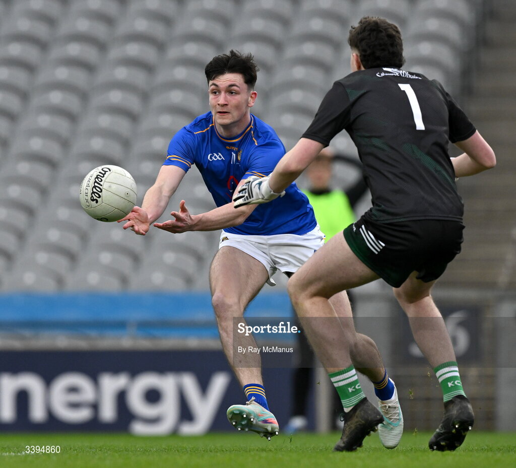 17 March 2026; Ronan Carroll of Tralee CBS in action against Coláiste Mhuire Mullingar goalkeeper Adam Buckley during the Masita GAA Post Primary Schools Hogan Cup final match between Coláiste Mhuire Mullingar, Westmeath, and Tralee CBS, Kerry,  at Croke Park in Dublin. Photo by Ray McManus/Sportsfile