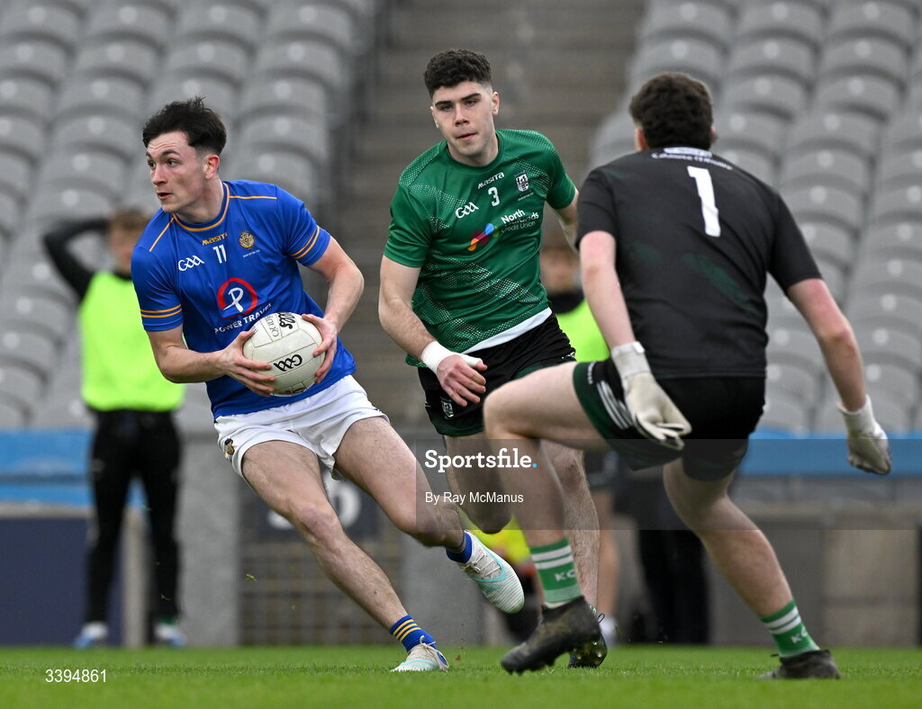 17 March 2026; Ronan Carroll of Tralee CBS in action against Ty Masterson amnd Coláiste Mhuire Mullingar goalkeeper Adam Buckley during the Masita GAA Post Primary Schools Hogan Cup final match between Coláiste Mhuire Mullingar, Westmeath, and Tralee CBS, Kerry,  at Croke Park in Dublin. Photo by Ray McManus/Sportsfile