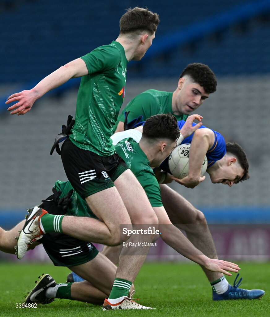 17 March 2026; Gearóid White of Tralee CBS is tackled by during Coláiste Mhuire Mullingar players from right, Ty Masterson, Michael Weir and Eoin Donohue during the Masita GAA Post Primary Schools Hogan Cup final match between Coláiste Mhuire Mullingar, Westmeath, and Tralee CBS, Kerry,  at Croke Park in Dublin. Photo by Ray McManus/Sportsfile