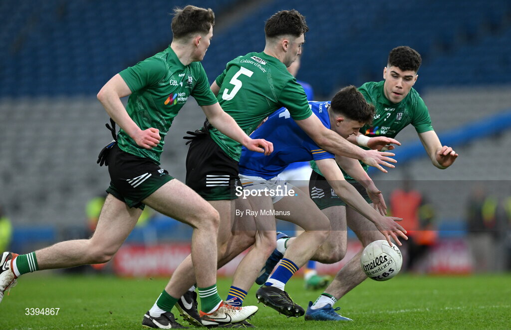 17 March 2026; Gearóid White of Tralee CBS is tackled by during Coláiste Mhuire Mullingar players from right, Ty Masterson, Michael Weir and Eoin Donohue during the Masita GAA Post Primary Schools Hogan Cup final match between Coláiste Mhuire Mullingar, Westmeath, and Tralee CBS, Kerry,  at Croke Park in Dublin. Photo by Ray McManus/Sportsfile