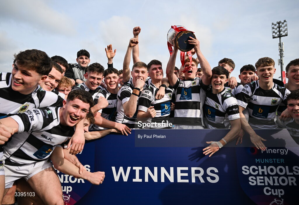 18 March 2026; Rian MacFarlane O'Shea of Presentation Brothers College lifts the Garrett Fitzgerald Cup with his teammates after the Pinergy Munster Schools Boys Senior Cup final match between Presentation Brothers College, Cork and St. Munchin’s College, Limerick at Virgin Media Park in Cork. Photo by Paul Phelan/Sportsfile