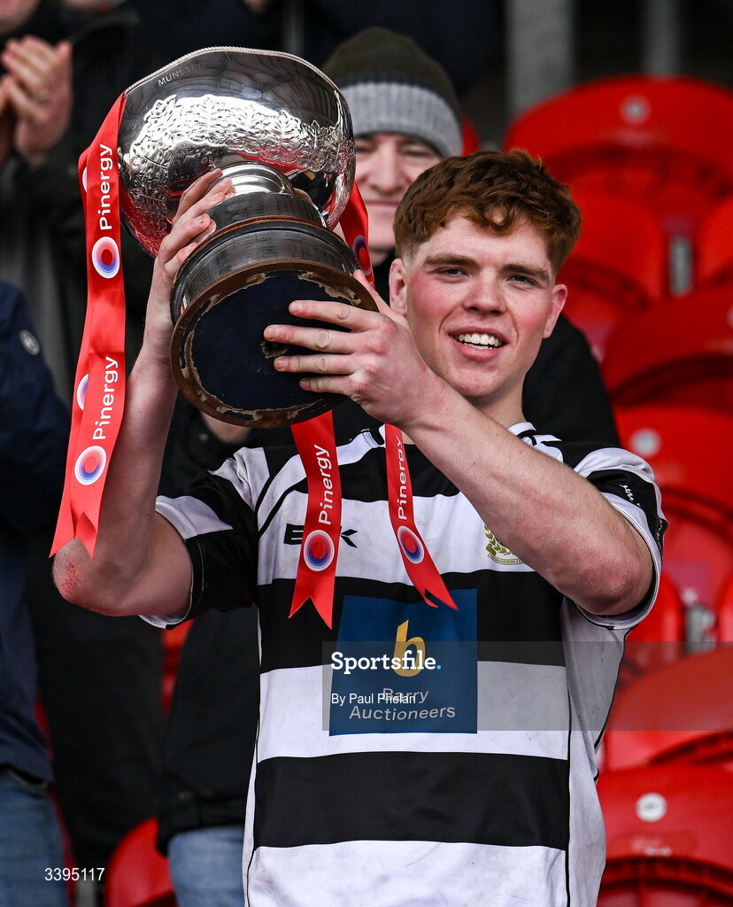 18 March 2026; Rian MacFarlane O'Shea of Presentation Brothers College lifts the Garrett Fitzgerald Cup after the Pinergy Munster Schools Boys Senior Cup final match between Presentation Brothers College, Cork and St. Munchin’s College, Limerick at Virgin Media Park in Cork. Photo by Paul Phelan/Sportsfile