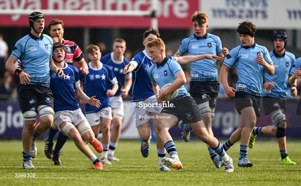20 March 2026; Eoghan McNulty of St Michael’s College is tackled by Moss Sheehan of St Mary’s College during the Bank of Ireland Leinster Rugby Boys Schools Junior Cup final match between St Mary's College and St Michael's College at Energia Park in Dublin. Photo by Daire Brennan/Sportsfile