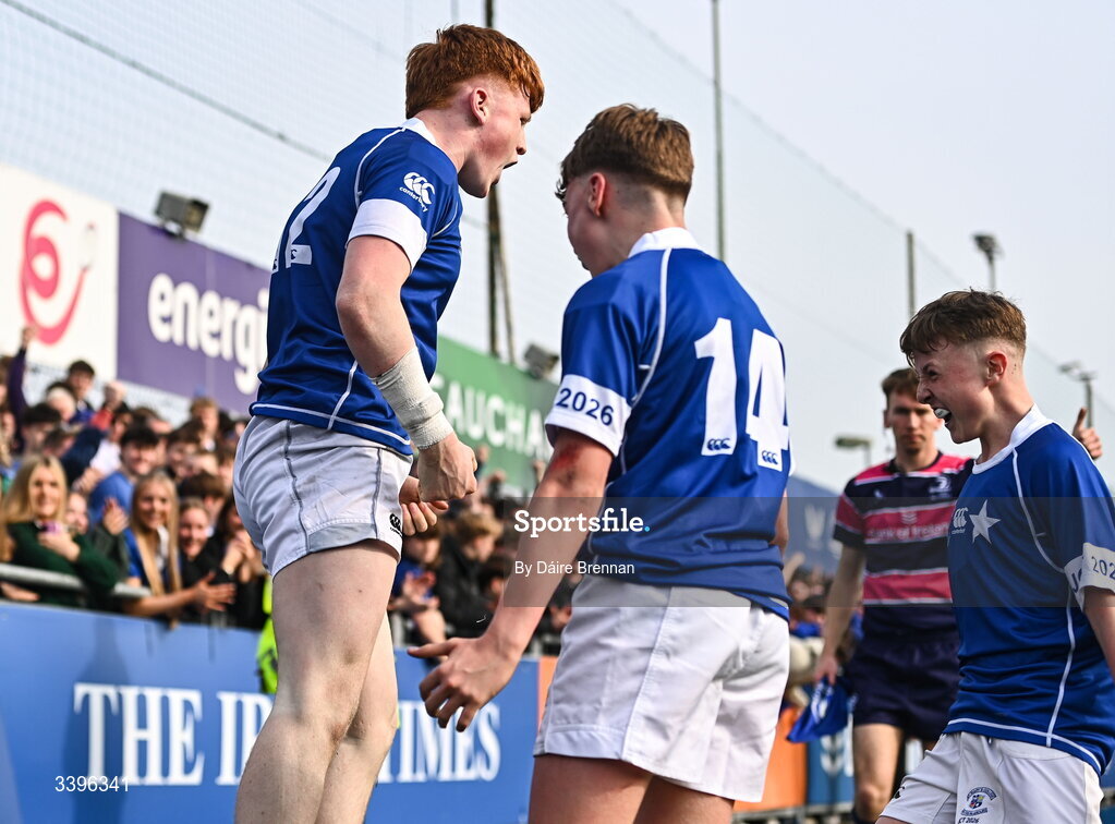 20 March 2026; Adam Smyth, left, of St Mary’s College celebrates after scoring his side's second try with team-mates Conor Rapple, left, and Danny Bishop during the Bank of Ireland Leinster Rugby Boys Schools Junior Cup final match between St Mary's College and St Michael's College at Energia Park in Dublin. Photo by Daire Brennan/Sportsfile