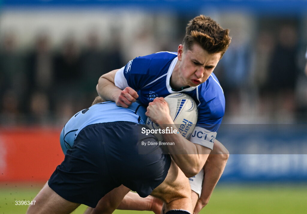 20 March 2026; Hugh Fitzgerald of St Mary’s College is tackled by Myles Carroll of St Michael’s College during the Bank of Ireland Leinster Rugby Boys Schools Junior Cup final match between St Mary's College and St Michael's College at Energia Park in Dublin. Photo by Daire Brennan/Sportsfile