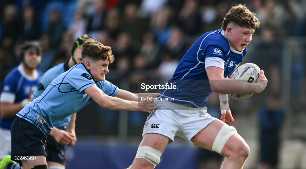 20 March 2026; Finn McEntee of St Mary’s College is tackled by Tommy Asple of St Michael’s College during the Bank of Ireland Leinster Rugby Boys Schools Junior Cup final match between St Mary's College and St Michael's College at Energia Park in Dublin. Photo by Daire Brennan/Sportsfile