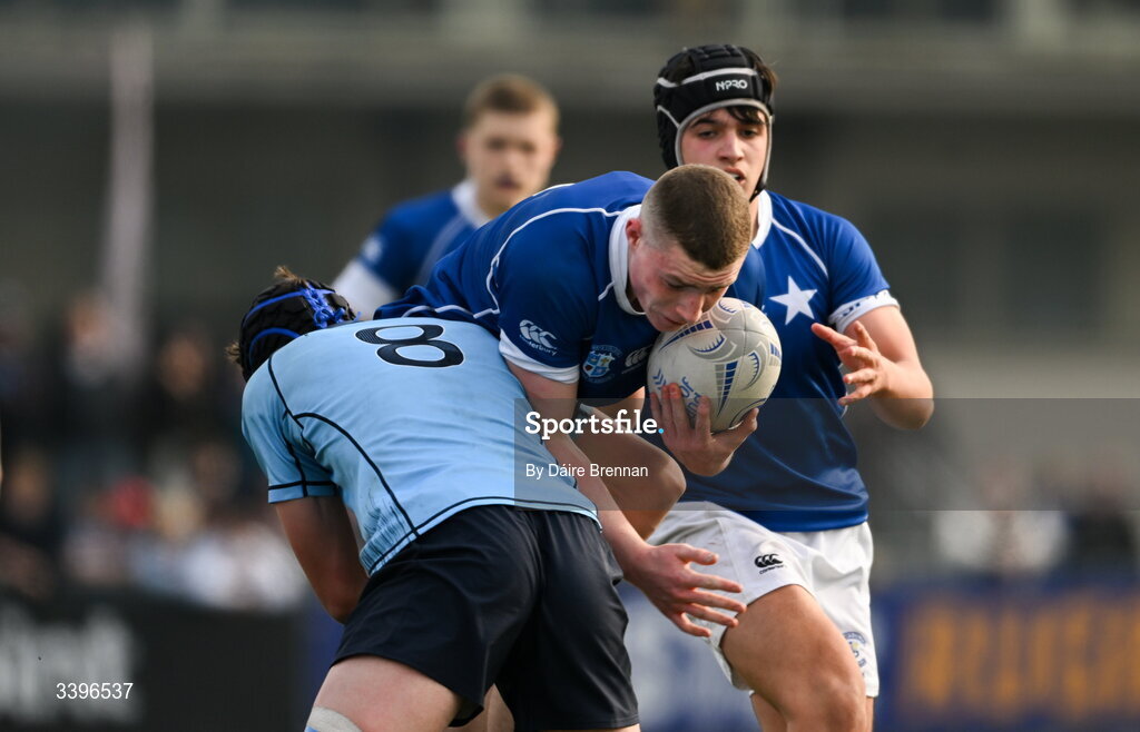 20 March 2026; Adam Brennan of St Mary’s College is tackled by Ryan O’Malley of St Michael’s College during the Bank of Ireland Leinster Rugby Boys Schools Junior Cup final match between St Mary's College and St Michael's College at Energia Park in Dublin. Photo by Daire Brennan/Sportsfile