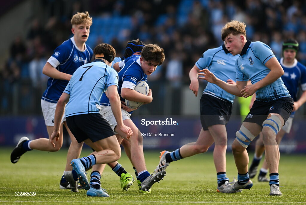 20 March 2026; Robbie Ryan of St Mary’s College is tackled by Ryan O’Malley of St Michael’s College during the Bank of Ireland Leinster Rugby Boys Schools Junior Cup final match between St Mary's College and St Michael's College at Energia Park in Dublin. Photo by Daire Brennan/Sportsfile